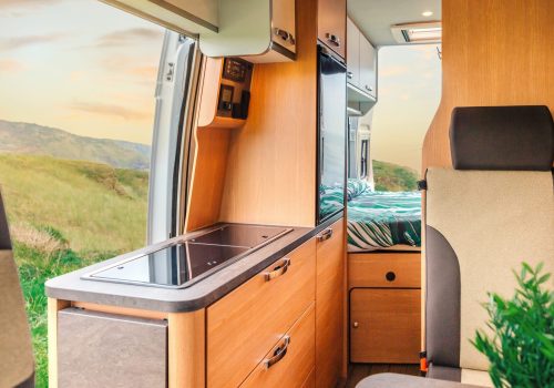 Interior,Of,A,Camper,Van,With,Kitchen,And,Bed,In
